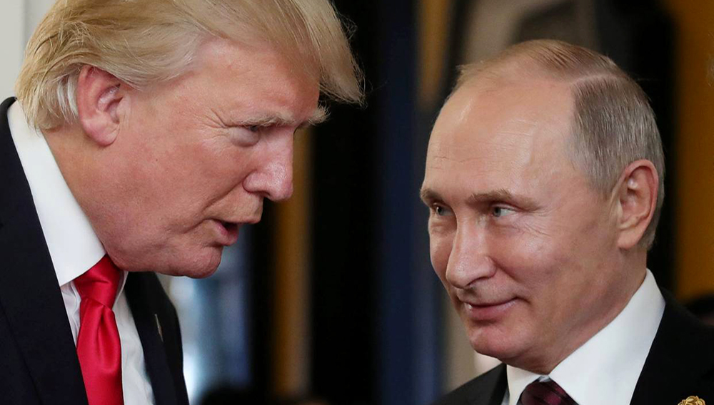 President Donald Trump, left, chatting with Russian President Vladimir Putin during a conference in Danang, Vietnnam on Nov. 11, 2017. Images PHOTO: MIKHAIL KLIMENTYEV/AGENCE FRANCE-PRESSE/GETTY IMAGES