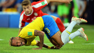 Brazil's Neymar (front) reacts during the FIFA World Cup 2018 group E preliminary round soccer match between Serbia and Brazil in Moscow, Russia.