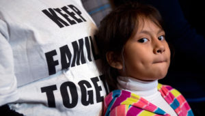 Heather Pina-Ledezma, 6, attends a news conference in the Capitol with Democratic senators and families impacted by President Obama's executive action on undocumented immigrants and to call on Republicans to pass immigration legislation, December 10, 2014. Heather's mother Madai is from Mexico but Heather was born in Annapolis. Photo: Getty Images
