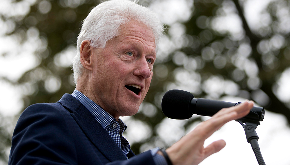 Former President Bill Clinton campaigning for his wife, Democratic presidential candidate Hillary Clinton, in October. (AP Photo/John Minchillo, File)