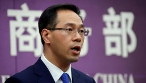 In this Friday, April 6, 2016, file photo, Chinese Ministry of Commerce spokesman Gao Feng speaks during a press conference at the Ministry of Commerce in Beijing. China's government has denied President Xi Jinping's promises this week to cut import tariffs on cars and open China's markets wider were intended as an overture to settle a tariff dispute with Washington. (AP Photo/Andy Wong, File)