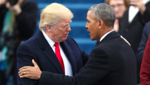 U.S. President-elect Donald Trump greets outgoing President Barack Obama before Trump is inaugurated during ceremonies on the Capitol in Washington, D.C., on Jan. 20, 2017. Photo by Carlos Barria/Reuters