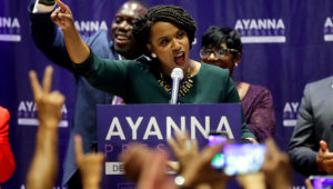 Boston City Councilor Ayanna Pressley celebrates her victory Tuesday over Rep. Michael Capuano in the Democratic primary for the state's 7th District congressional seat. Steven Senne / AP
