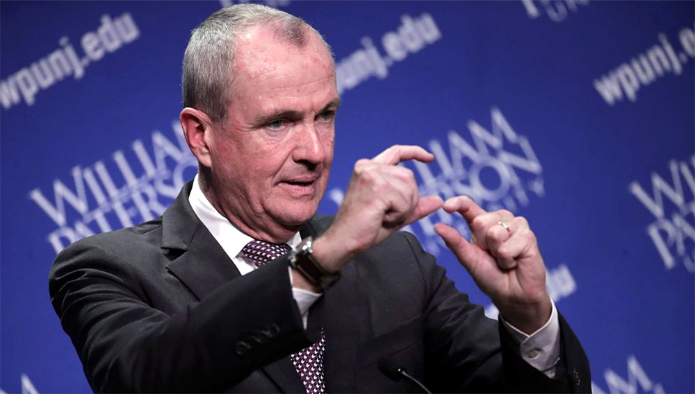 Democratic nominee Phil Murphy talks to reporters after participating in a gubernatorial debate against Republican nominee Lt. Gov. Kim Guadagno at William Paterson University, Wednesday, Oct. 18, 2017, in Wayne, N.J. (AP Photo/Julio Cortez) The Associated Press