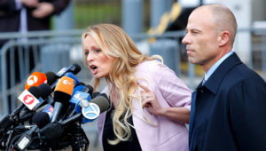 Adult-film actress Stephanie Clifford, also known as Stormy Daniels speaks US Federal Court with her lawyer Michael Avenatti (R) on April 16, 2018, in Lower Manhattan, New York.
