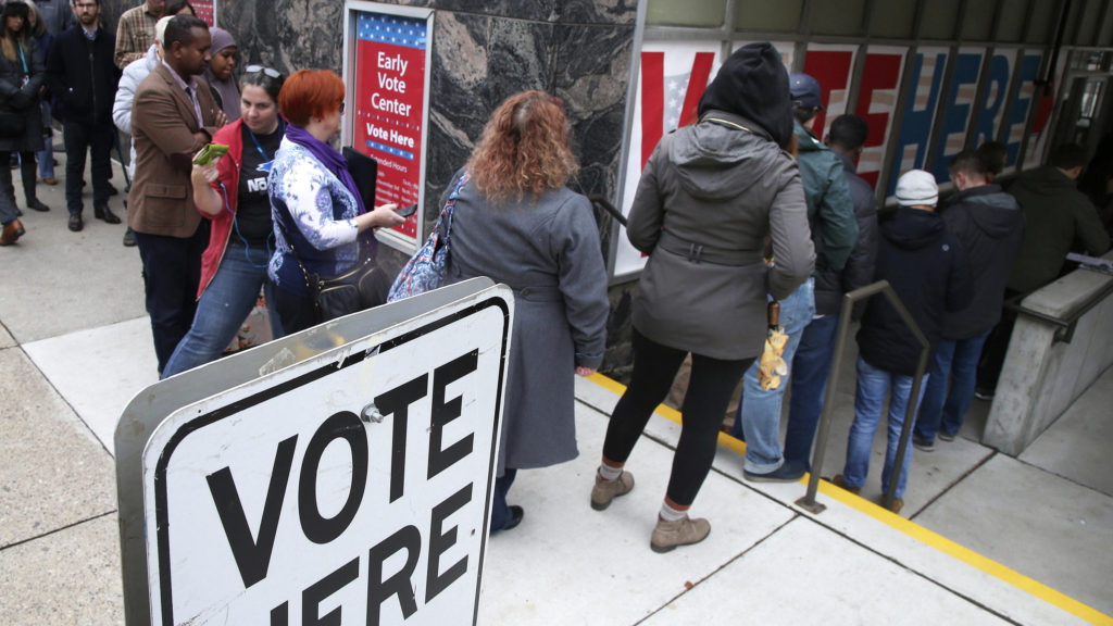 Some voters in Minneapolis took advantage of the last day of early voting on Monday. JIM MONE / AP