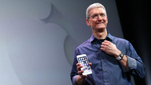 Apple CEO Tim Cook shows off the new iPhone 6 and the Apple Watch during an Apple special event at the Flint Center for the Performing Arts on September 9, 2014 in Cupertino, California. Apple is expected to unveil the new iPhone 6 and wearble tech. Photograph by Justin Sullivan—Getty