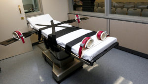 This Oct. 9, 2014, file photo shows the gurney in the the execution chamber at the Oklahoma State Penitentiary in McAlester, Okla. (AP Photo/Sue Ogrocki, File)