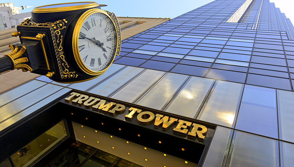 NEW YORK CIRCA APRIL 2015. The Trump Tower on Fifth Avenue and its clock, illustrates the high-end mixed use skyscrapers common in Manhattan which combine both commercial and residential use. | Robert Cicchetti / Shutterstock.com