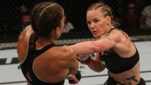 (R-L) Valentina Shevchenko punches Liz Carmouche in their UFC women's flyweight championship fight during UFC Fight Night at Antel Arena on Aug. 10, 2019 in Montevideo, Uruguay. (Zuffa LLC)