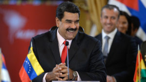 Venezuelan President Nicolas Maduro smiles while giving a speech during the Bolivarian Alliance for the Peoples of Our America (ALBA) summit at the Miraflores presidential palace in Caracas on March 5, 2017. | PHOTO: FEDERICO PARRA/AFP/Getty Images)