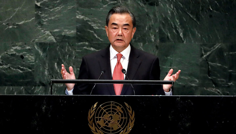 China's Foreign Minister Wang Yi addresses the 73rd session of the United Nations General Assembly, at U.N. headquarters, Friday, Sept. 28, 2018. (AP Photo/Richard Drew)