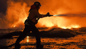 KNIGHTSEN, CA - OCTOBER 27: Firefighters battle a grass fire on East Cypress Road in Knightsen, Calif., on Sunday, Oct. 27, 2019. The grass fire originated 3:08 am on Gateway Blvd. on Bethel Island as reported by the East Contra Costa Fire Department. The fire then spread to a second location on East Cypress Road at 5:45 am. (Jose Carlos Fajardo/Bay Area News Group)