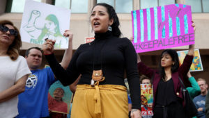 Alejandra Pablos speaks to supporters before her hearing at the federal building in downtown Tucson on Tuesday. An immigration judge, noting her arrest record, ordered that she be deported. (Photo: Mamta Popat/Arizona Daily Star)
