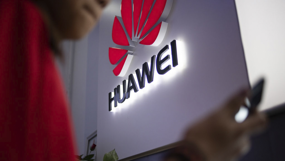 A Huawei logo is displayed at a retail store in Beijing, China on May 27, 2019. Fred Dufour—AFP/Getty Images