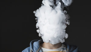The face of vaping young man. Photo: stock.adobe.com