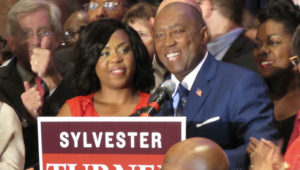 Sylvester Turner and daughter Ashley Turner (left) thank supporters on election night. Photo: Gail Delaughter/Houston Public Media
