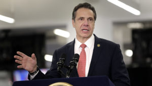 FILE - In this Feb. 14, 2019, file photo, New York Gov. Andrew Cuomo speaks before signing the Child Victims Act in New York. There are growing indications that Cuomo and fellow Democrats in the Legislature may not be able to reach an agreement on the next New York state budget by an April 1 deadline. (AP Photo/Seth Wenig, File)
