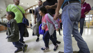 A group of immigrants from Honduras and Guatemala seeking asylum arrive at the bus station after they were processed and released by U.S. Customs and Border Protection in McAllen, Texas. (Photo: Eric Gay, AP Images)