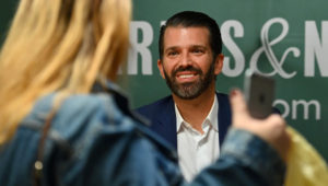 Donald Trump Jr., signs his new Book "Triggered: How the Left Thrives on Hate and Wants to Silence Us" at Barnes & Noble on 5th Avenue on November 5, 2019 in New York. (Angela Weiss / AFP)