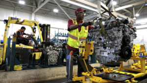 A worker moves an engine from the final assembly line at the GM Romulus Powertrain plant in Romulus, Michigan, on Aug. 21, 2019. (Photo: Rebecca Cook/Reuters)