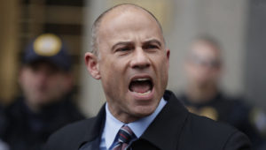 In this Dec. 12, 2018 file photo, Michael Avenatti, lawyer for porn star Stormy Daniels, speaks outside court in New York. U.S. prosecutors announced Monday, March 25, 2019 they have charged Avenatti with extortion and bank and wire fraud. A spokesman for the U.S. attorney in Los Angeles said Avenatti was arrested Monday in New York. (AP Photo/Julio Cortez)