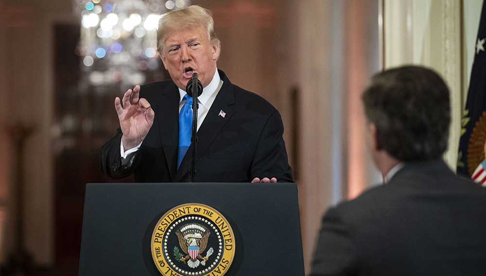 U.S. President Donald Trump gets into an exchange with CNN reporter Jim Acosta during a news conference a day after the midterm elections on November 7, 2018 in the East Room of the White House in Washington, DC. Republicans kept the Senate majority but lost control of the House to the Democrats. (Photo by Al Drago - Pool/Getty Images)