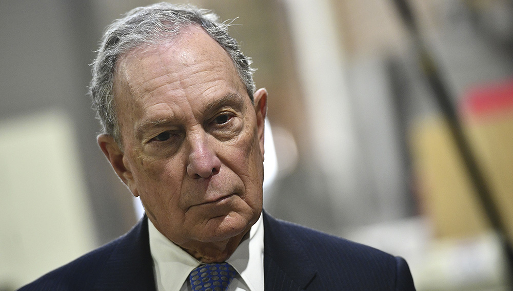 US Democratic Presidential candidate, Mike Bloomberg, looks on while visiting 'Building Momentum', a veteran owned business in Alexandria, Virginia on February 7, 2020. (Photo by Mandel NGAN / AFP) (Photo by MANDEL NGAN/AFP via Getty Images)