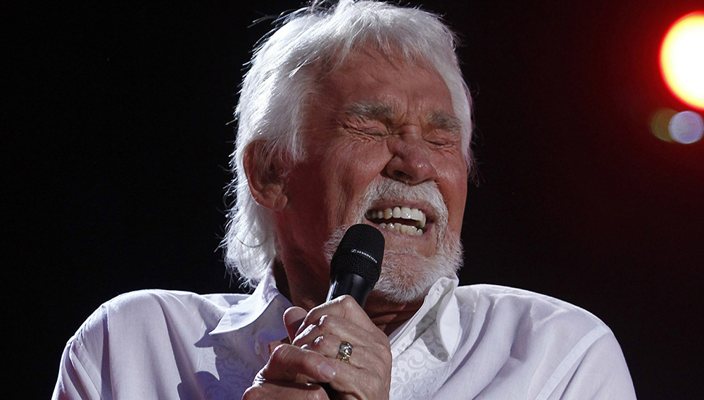 FILE - In this June 9, 2012, file photo, Kenny Rogers performs at the 2012 CMA Music Festival in Nashville, Tenn. Actor-singer Kenny Rogers, the smooth, Grammy-winning balladeer who spanned jazz, folk, country and pop with such hits as “Lucille,” “Lady” and “Islands in the Stream” and embraced his persona as “The Gambler” on record and on TV died Friday night, March 20, 2020. He was 81. (Photo by Wade Payne/Invision/AP, File)