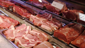 Sliced raw meat on a shelf in a supermarket. Fresh food. | Victor Koldunov | Dreamstime.com