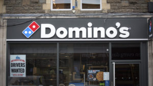A branch of Domino's pizza takeaway is pictured on February 19, 2018 in Bath, England. (Photo by Matt Cardy/Getty Images)