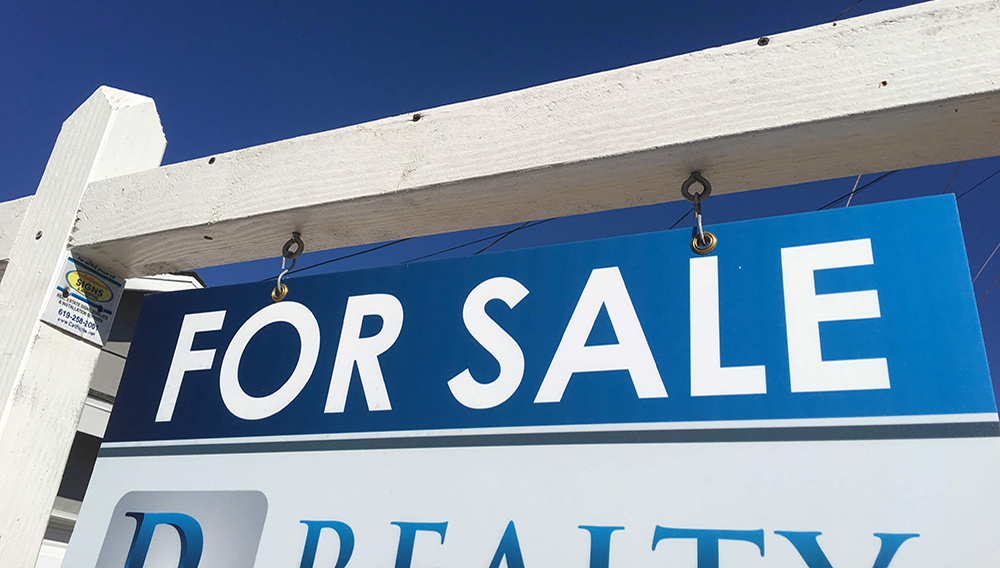 A 'For Sale' sign in front of a home in San Carlos in this undated photo. | PHOTO BY KPBS STAFF