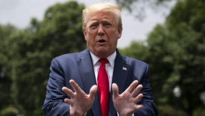 President Donald Trump talks to reporters before departing the White House for a trip to Michigan, Thursday, May 21, 2020, in Washington. (AP Photo/Evan Vucci) (Copyright 2020 The Associated Press. All rights reserved)