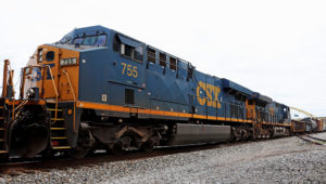 A CSX freight train rolls past downtown Pittsburgh on Monday, June 24, 2019. (AP Photo/Gene J. Puskar)