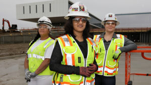 Karen Antunez, left, Nikita Bhagat, and Lisa Ferkinghoff are among the many women joining the construction industry. All three are working on the Collin College Technical Campus construction site in Allen. | Photo: Jason Janik