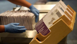 Envelopes containing ballots are shown at a San Francisco Department of Elections at a voting center in San Francisco, Sunday, Nov. 1, 2020. (AP Photo/Jeff Chiu)
