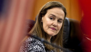 This Dec. 7, 2011 file photo shows former U.S. Defense Undersecretary Michele Flournoy, preparing for a bilateral meeting in Beijing, China. Flournoy, a politically moderate Pentagon veteran, is regarded by U.S. officials and political insiders as a top choice for President-elect Joe Bide to choose to head the Pentagon. (AP Photo/Andy Wong, File)