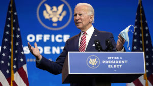 President-elect Joe Biden, accompanied by Vice President-elect Kamala Harris, speaks about economic recovery at The Queen theater, Monday, November 16, 2020, in Wilmington, Del. (AP Photo/Andrew Harnik)