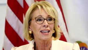 In this Oct. 15, 2020, file photo Secretary of Education Betsy DeVos speaks at the Phoenix International Academy in Phoenix. DeVos has extended the moratorium on student loan payments and the accrual of interest until Jan. 31, 2021. (AP Photo/Matt York, File)