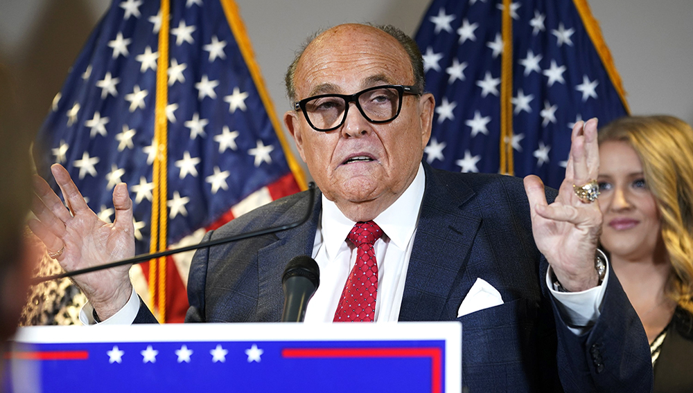 In this Nov. 19, 2020, file photo, former New York Mayor Rudy Giuliani, a lawyer for President Donald Trump, speaks during a news conference at the Republican National Committee headquarters, in Washington. (AP Photo/Jacquelyn Martin, File)