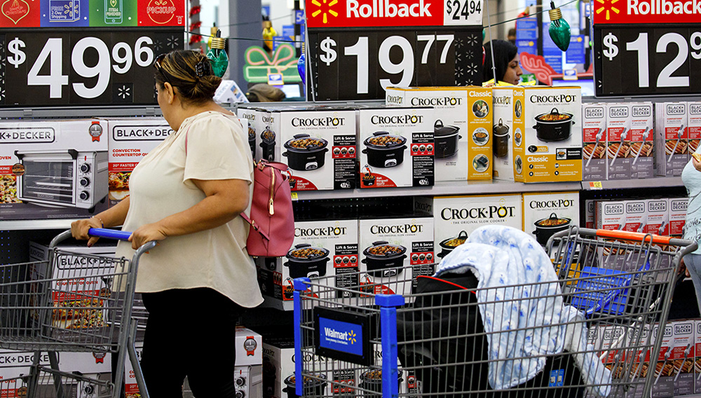 A customer browses products at a Walmart store in Burbank, California. | Patrick T. Fallon | Bloomberg | Getty Images