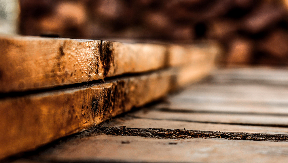 PHOTO: Shallow focus photography of brown wooden planks. | peakpx.com