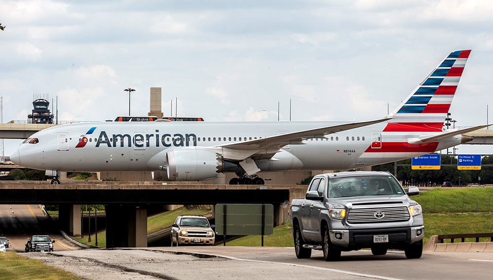 An American Airlines plane coasts the runway at DFW International Airport on Sunday, July 26, 2020.(Lynda M. Gonzalez / Staff Photographer)