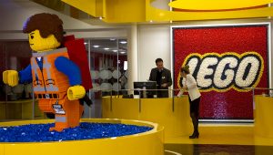 A Lego brick figurine of Emmet Brickowoski, a character from 'The Lego Movie', stands in the reception area at the headquarters of Lego A/S in Billund, Denmark. (Bloomberg photo)