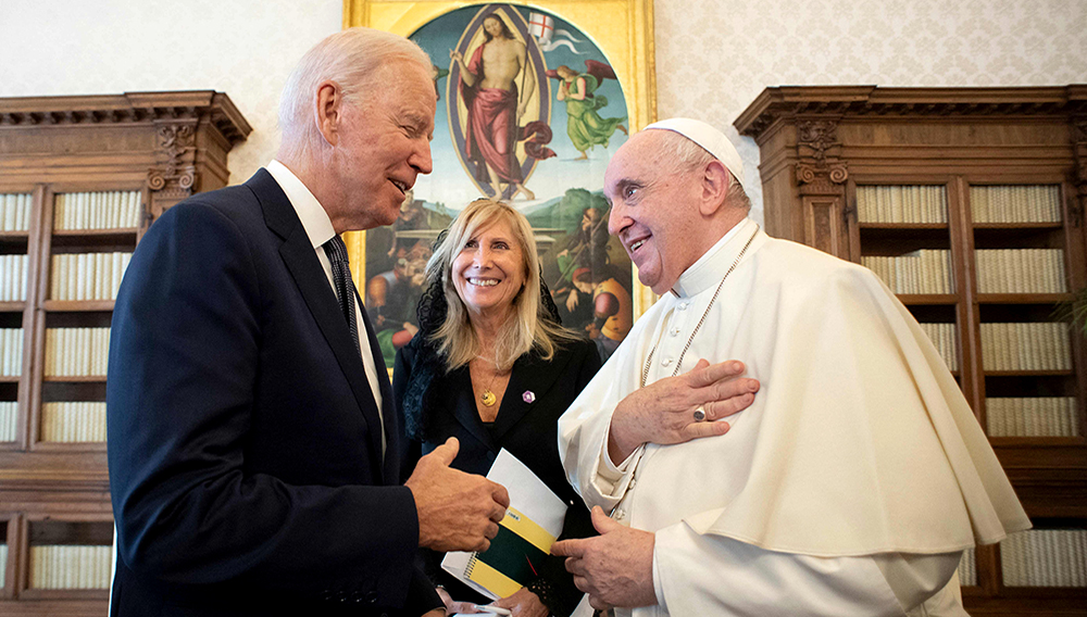 This handout photo by the Vatican Media shows Pope Francis meeting with President Joe Biden at the Vatican on Oct. 29, 2021. HANDOUT, VATICAN MEDIA/AFP Via Getty Images