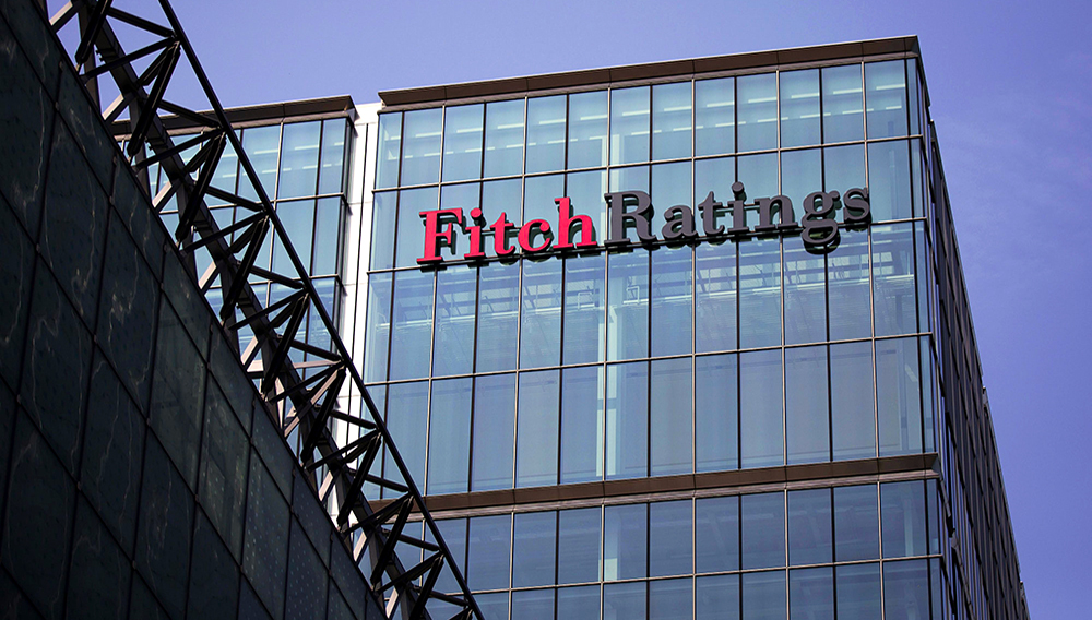 The headquarters of Fitch Ratings Ltd. stands in the Canary Wharf business and shopping district in London, U.K., on Friday, July 12, 2013. Photographer: Simon Dawson/Bloomberg