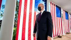 President Joe Biden walks past draped America flags along the Colonnade of the White House, Monday, November 15, 2021, en route to the Residence. (Official White House Photo by Adam Schultz)