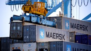 Gantry cranes unload Maersk A/S containers from a ship at the Port of Los Angeles in Los Angeles, California, U.S., on Wednesday, March 28, 2018. Photographer: Patrick T. Fallon/Bloomberg