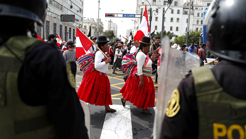 Demonstrators from Peru’s largely indigenous and poor highlands marching in Lima. PAOLO AGUILAR/EPA/SHUTTERSTOCK