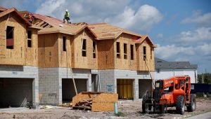 PHOTO: New townhomes are seen under construction while building material supplies are in high demand in Tampa, Florida, U.S., May 5, 2021. REUTERS/Octavio Jones.